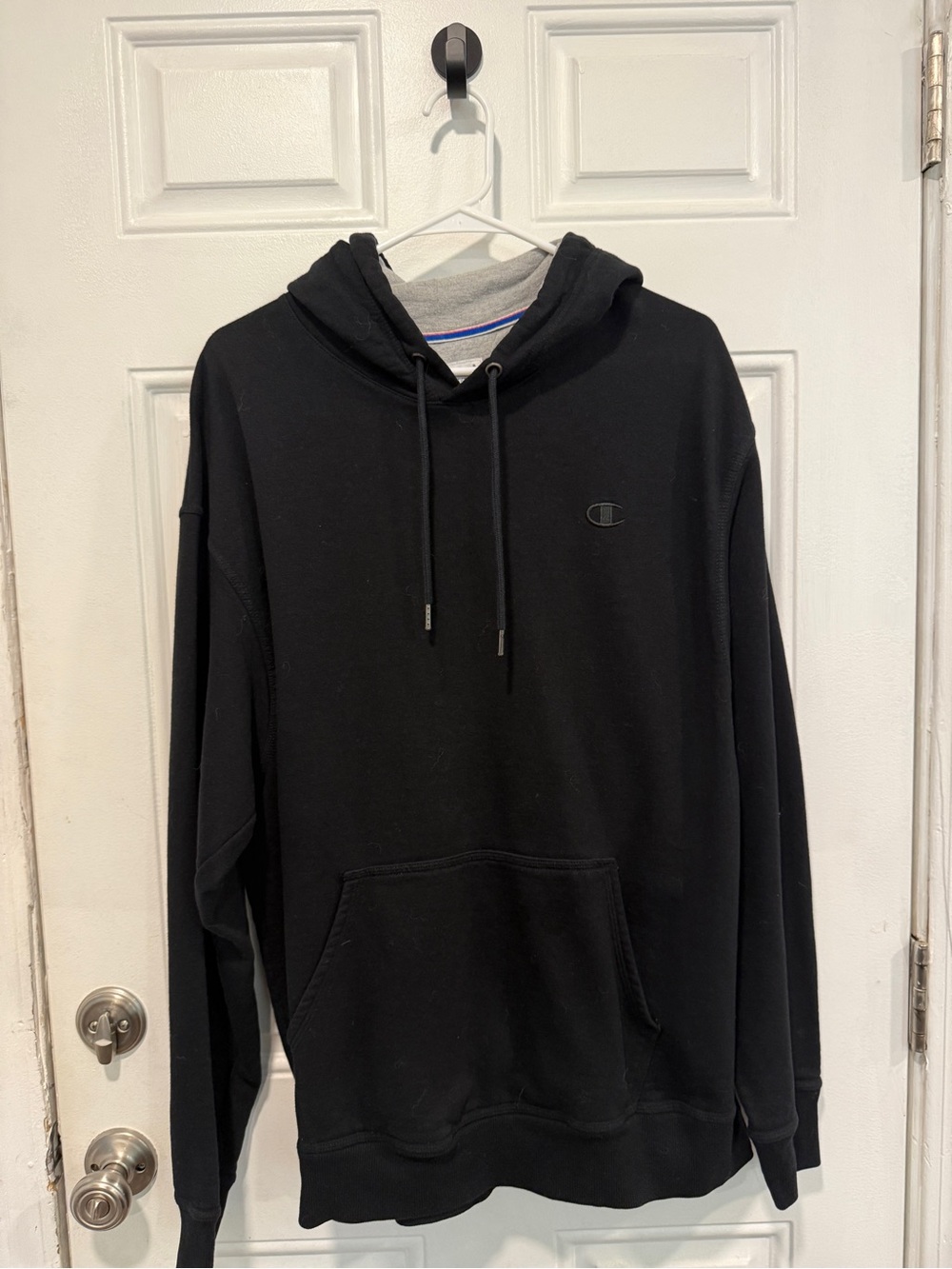 Champion XL Black Pullover Hoodie with Subtle Logo